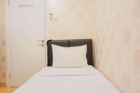 Nice and Spacious 2BR Green Pramuka City Apartment By Travelio